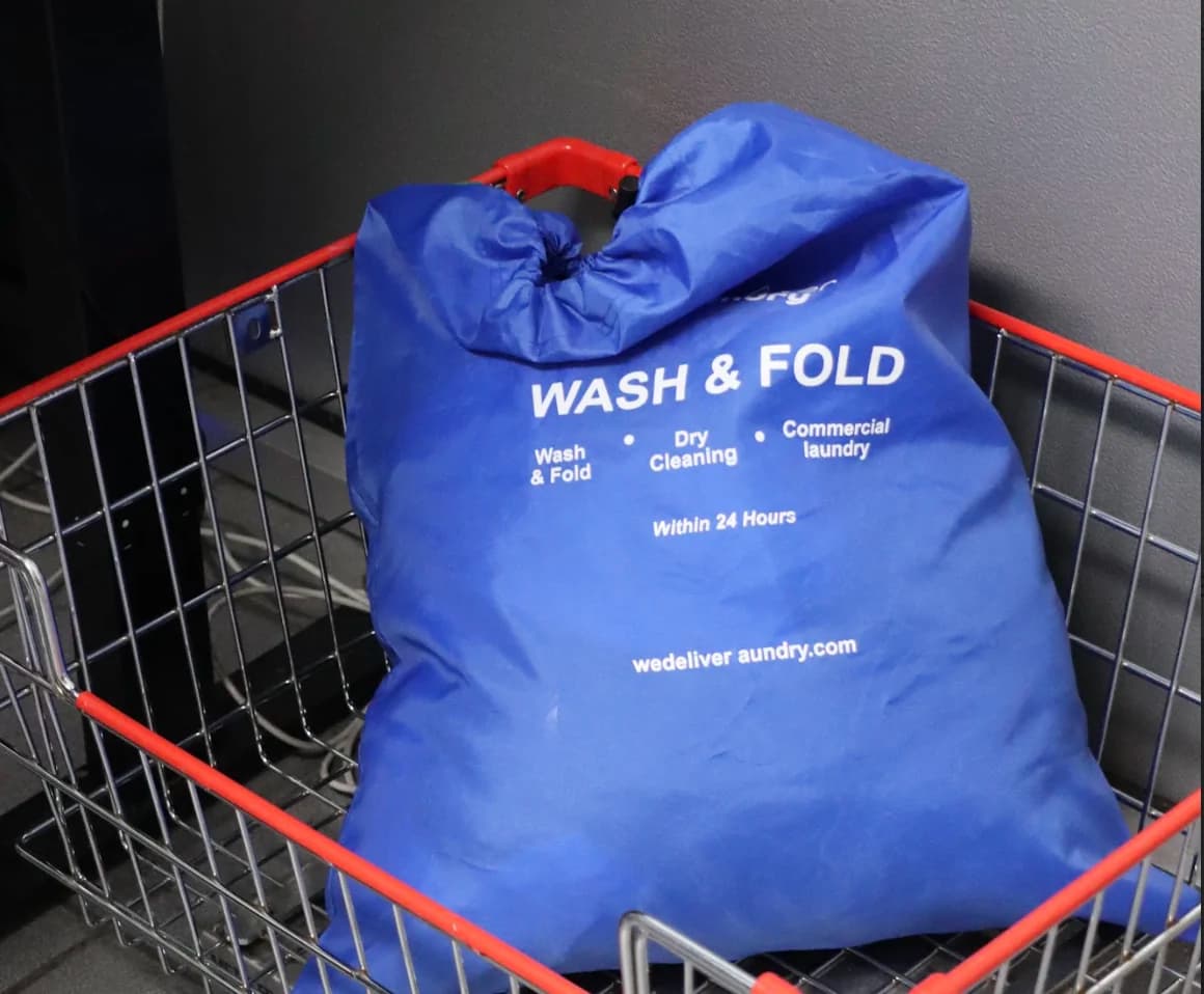 We Deliver Laundry commercial service - branded laundry bag